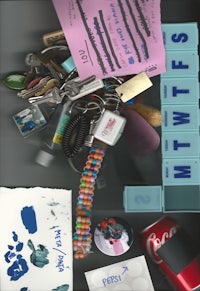 a group of keys and other items on a table