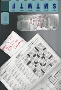 a crossword puzzle with a piece of paper next to it