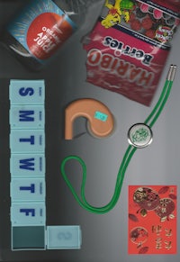 a group of items including a stethoscope, candy and a stethoscope