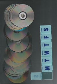 a stack of cds with the words mtws on them